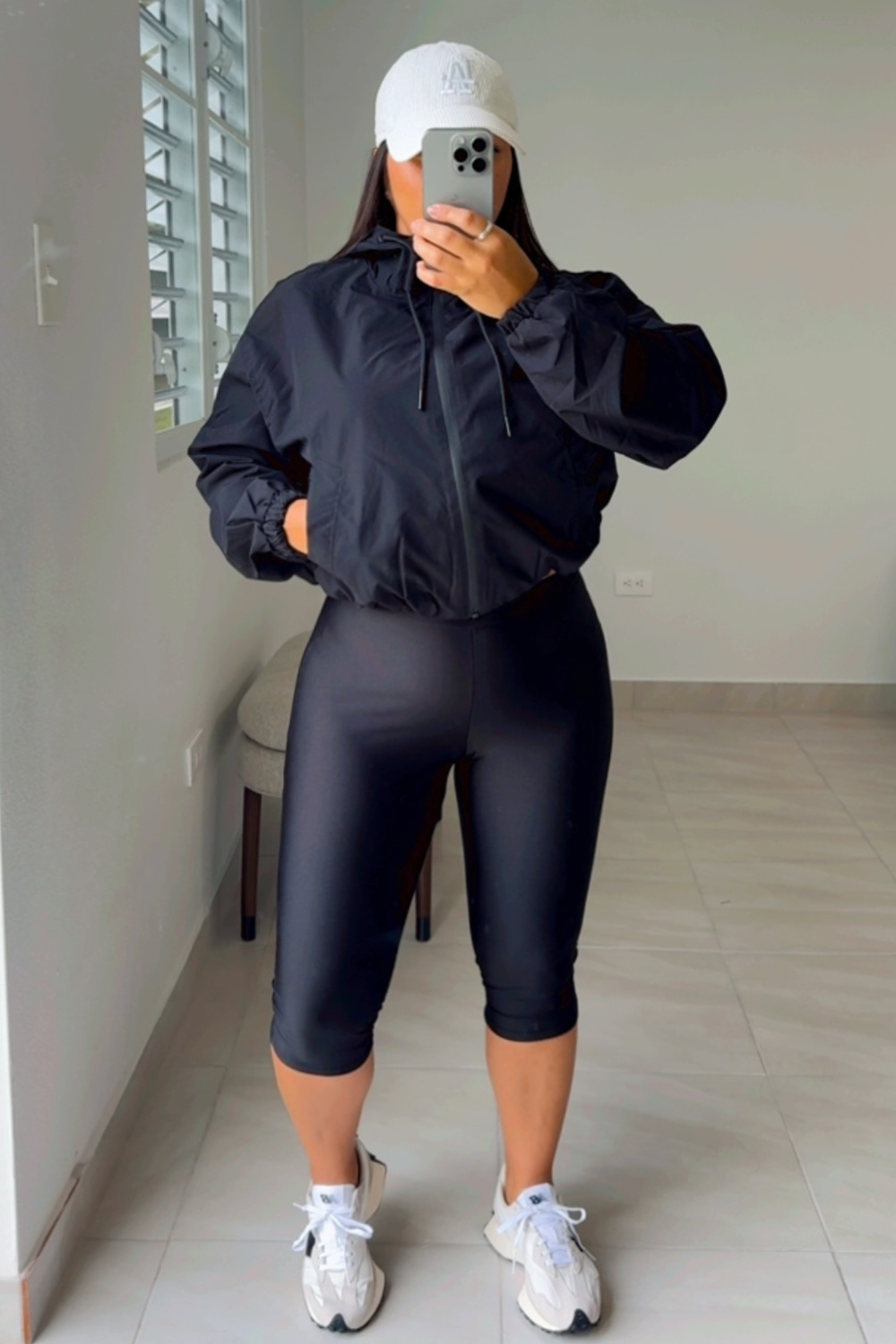 Black hooded windbreaker