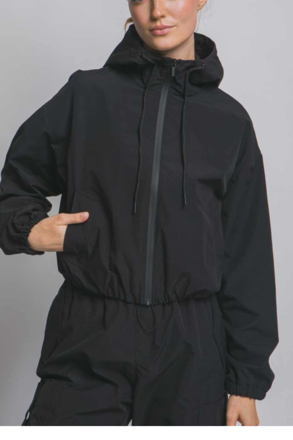 Black hooded windbreaker